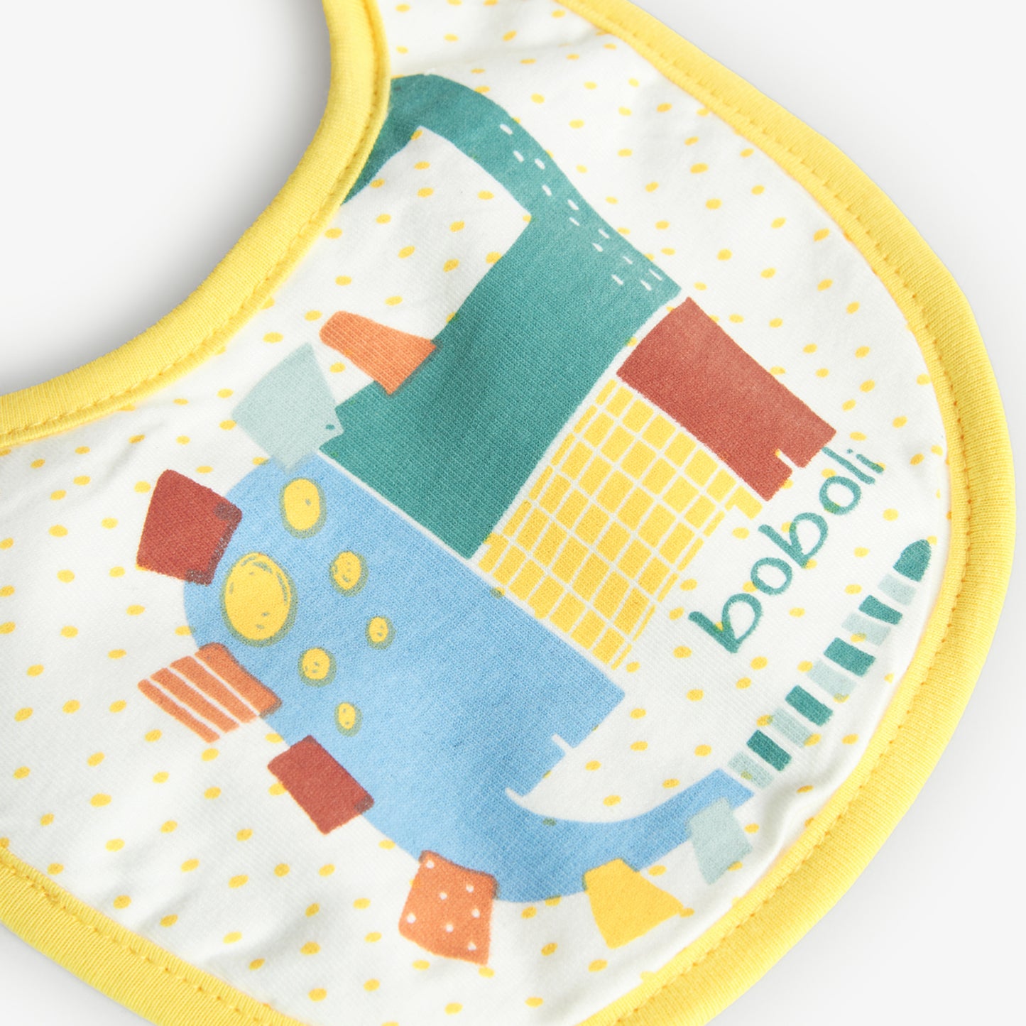 Babero Boboli Dots y Dinos Ambar