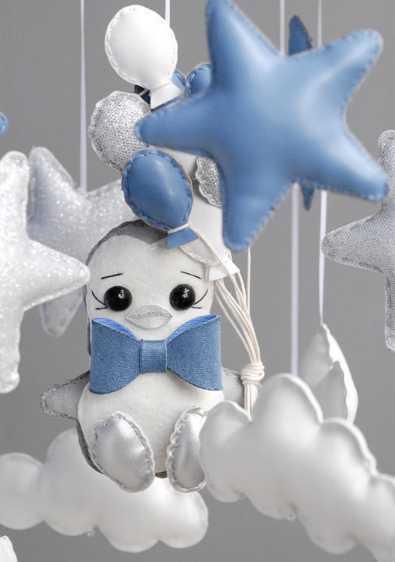 Movil pingüino con globos “ Llévame hacia las estrellas”